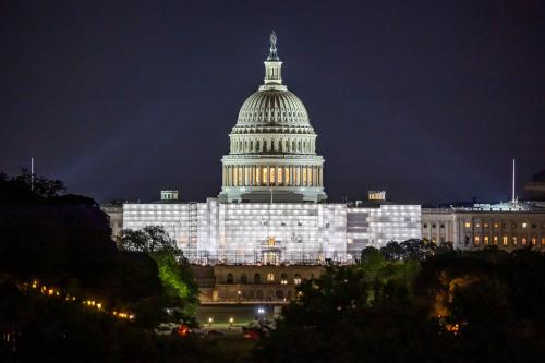 The United States Capitol with the illuminated Dome is seen at night